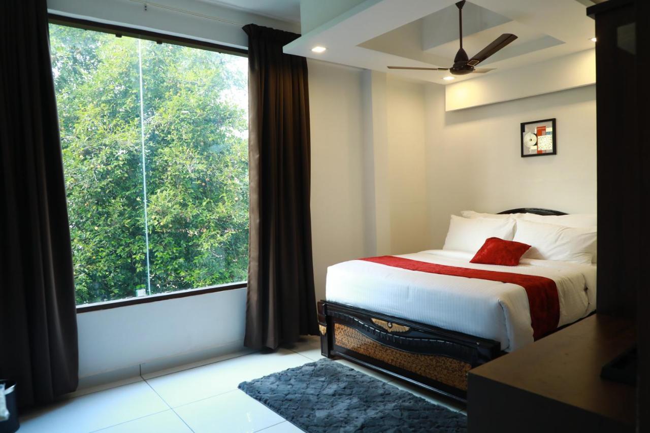 Achoos Residency Hotel Tiruvalla Ngoại thất bức ảnh