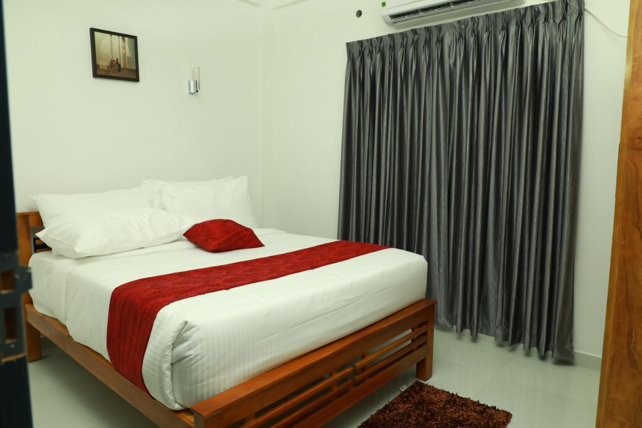 Achoos Residency Hotel Tiruvalla Ngoại thất bức ảnh