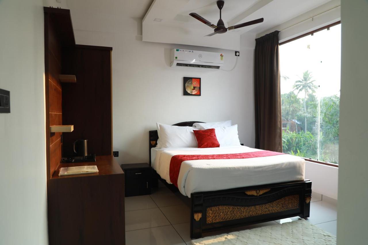 Achoos Residency Hotel Tiruvalla Ngoại thất bức ảnh